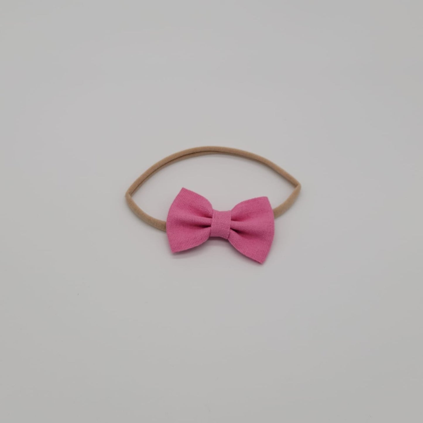 Nylon headband small bow dark rosa