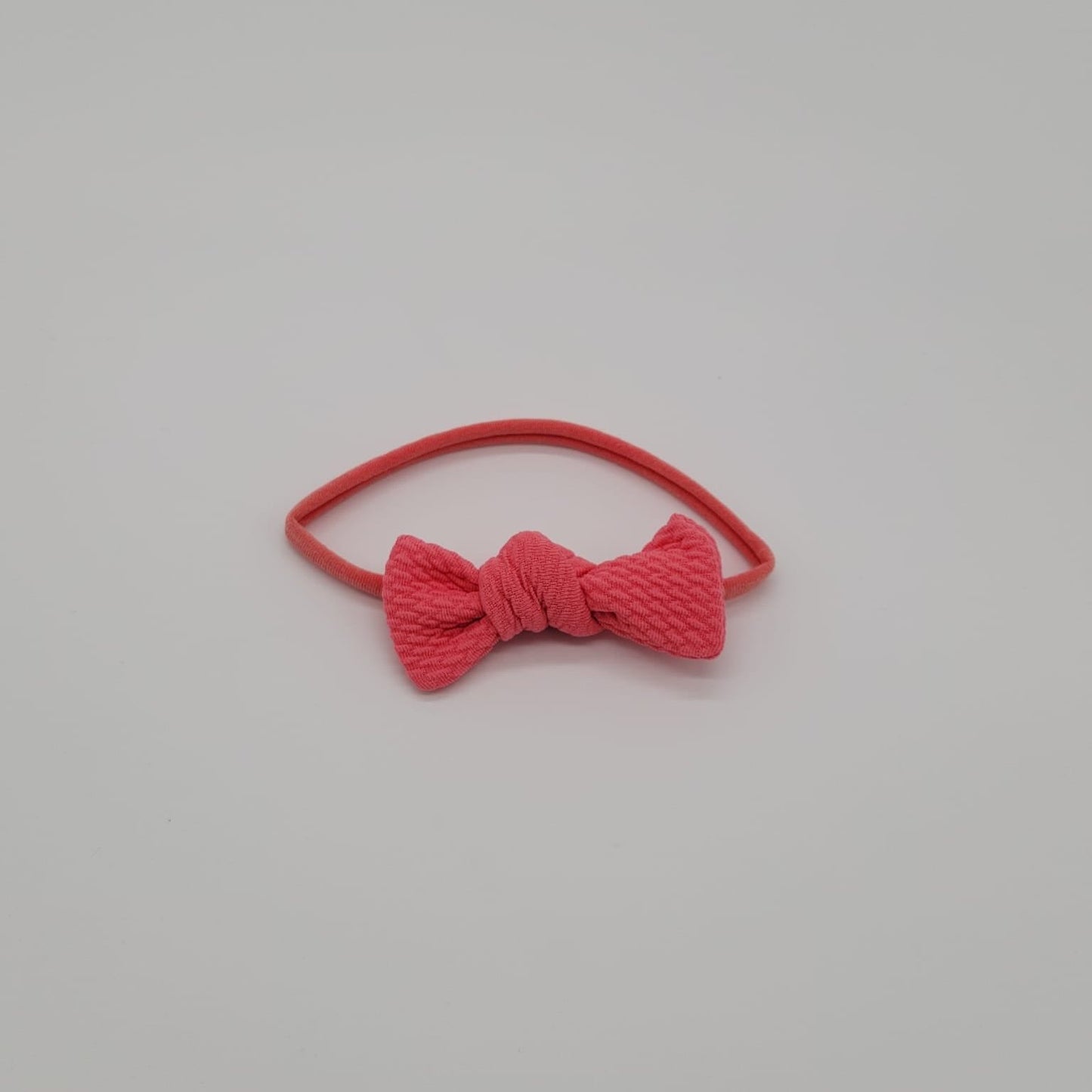 Nylon headband coral knot Sofia coral